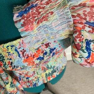Anthropologie blouse with smocking through bodice, sleeves w/smocking wrists.